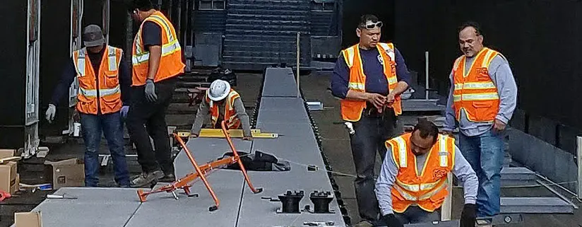 Angelus workers installing Pedestal Pavers at Gas Company Tower, Los Angeles, CA